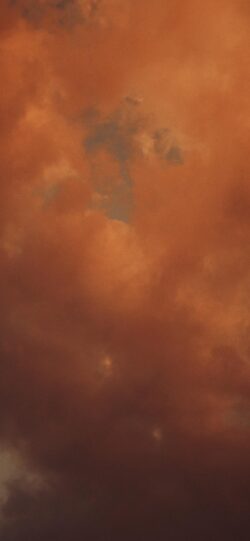 sky clouds sunset orange brown haze minimal abstract warmtones nature vertical moody texture background