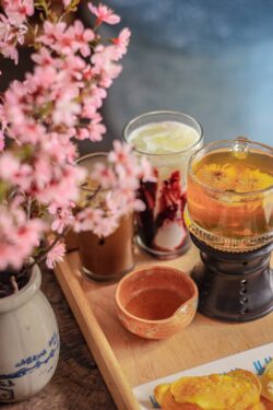tea drinks spring flowers pink blossom honey beverages morning cozy indoor lifestyle still life warm aesthetic