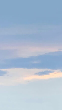 pastel sky soft blue pink clouds serene horizon calm sunset sunrise ethereal tranquil dreamy subtle weather nature