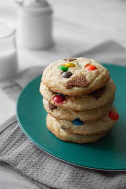cookies chocolate chip mms candy baked dessert sweet stack teal plate milk snack homemade pastry bakery food photography yummy