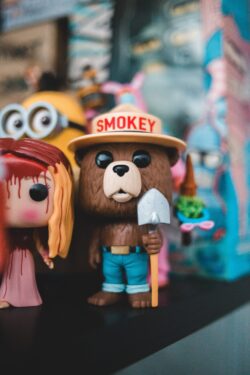 smokey bear funko pop toy collectibles vinyl figure minion horror gaming room hobby culture nostalgia character art shelf display