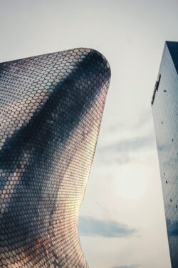 mexico city architecture museo soumaya modern building exterior silver facade abstract geometric design hexagonal tiles minimalist urban landmark contemporary structure futuristic museum