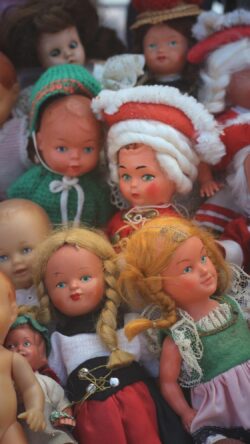 vintage dolls antique toys collection retro doll face plastic toys nostalgia childhood fair display traditional costume market dolls