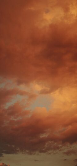 sunset clouds orange sky golden hour dusk red tones stormy weather nature warm dramatic atmospheric beautiful glowing