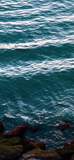 sea ocean water waves texture blue turquoise rocks coast nature minimal surface deep dark abstract