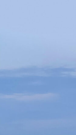 blue sky layered clouds soft pastel minimal serene calm horizon tranquil ethereal weather nature simple subtle gradient