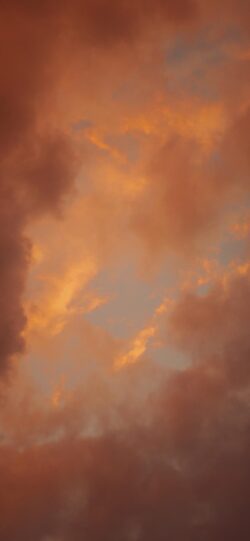 sunset clouds orange sky golden hour cloud texture atmospheric warm colors evening light dramatic sky aesthetic background fiery clouds abstract view pastel hues soft glow cloudy landscape dusk