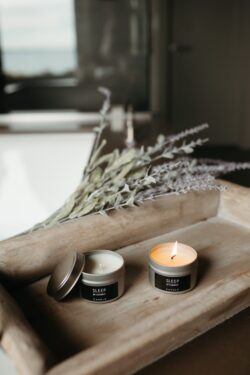 lavender candle sleep essential oils aromatherapy minimal product tray wooden calm relax scented flame indoor spa