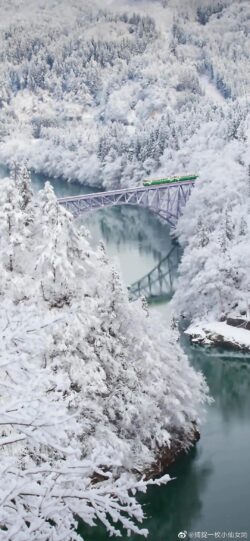 winter snow forest train bridge river japan scenic nature cold travel railway view aerial mountains