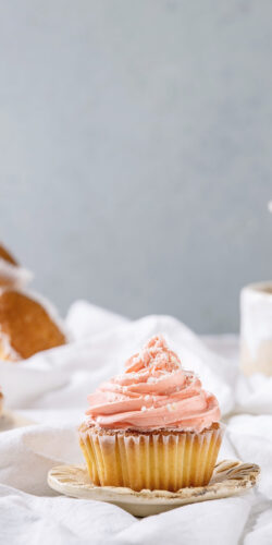 pink cupcake muffin dessert sweet frosting pastry bakery clean aesthetic minimal food photography white background treat gourmet